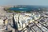 Looking across the man-made corniche to West Bay in the distance.
